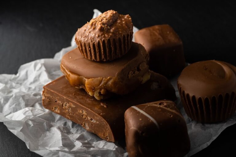 Why Does My Fudge Not Set? 7 Fixes That Work Assorted homemade chocolate fudge pieces arranged on dark paper