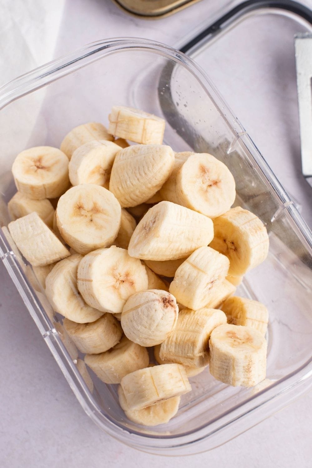 Banana slices stored in a glass container