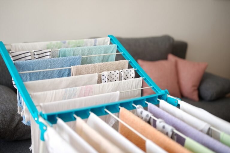 Clothes drying on an indoor airer in a living room