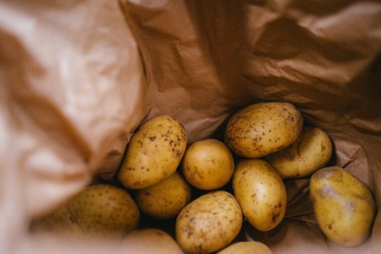Fresh potatoes kept in a paper bag for longer storage life