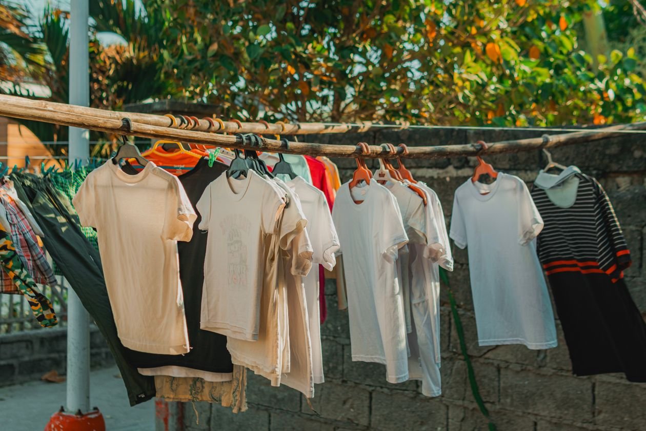 Fresh laundry hanging on an outdoor clothesline to dry naturally