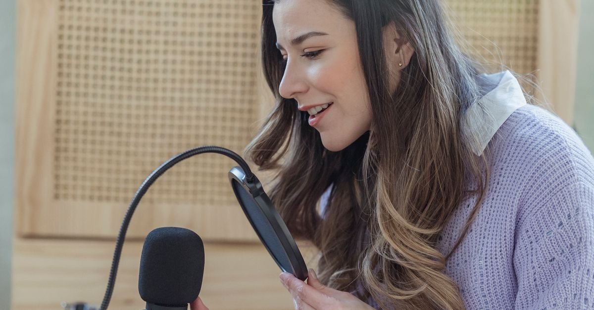 A studio microphone in a recording setup, a nod to the My Therapist Ghosted Me podcast hosted by Joanne McNally and Vogue Williams