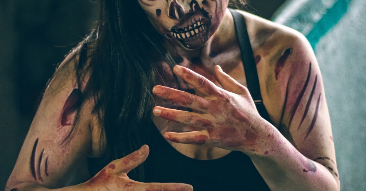 Fake blood applied to hands and arms for a zombie costume