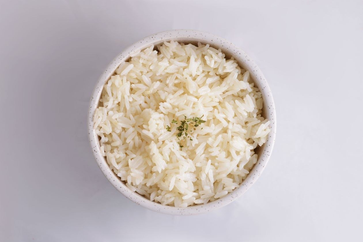 Bowl of plain cooked white rice seen from above